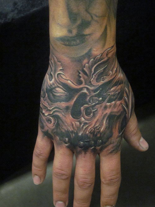 Black And Grey Scary Demon Face Tattoo On Hand