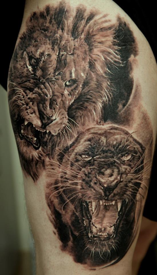 Black And Grey Scary Lion And Lioness Tattoo Design
