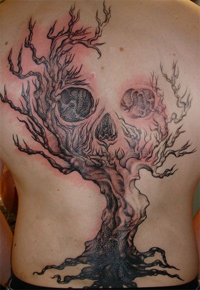 Black And Grey Scary Skull With Tree Without leaves Tattoo On Full Back