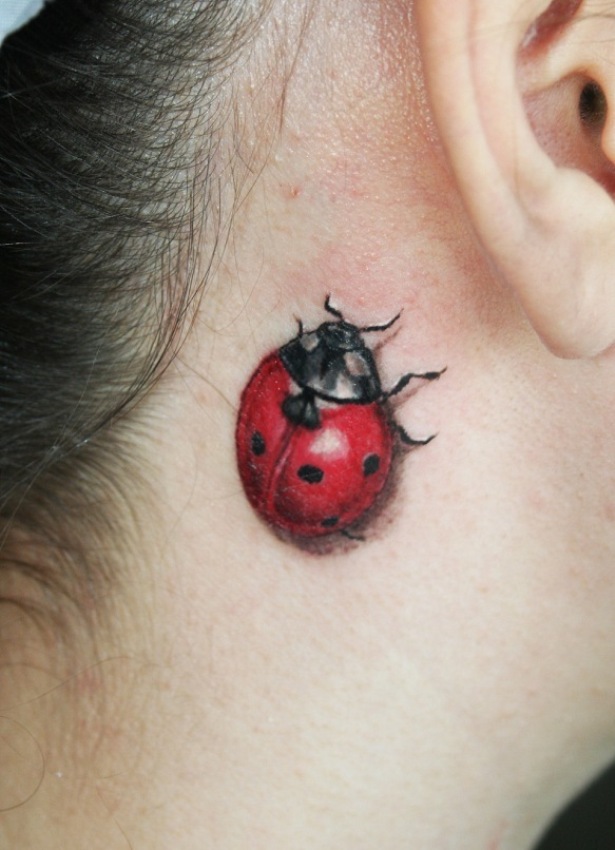 Black And Red 3D Ladybird Tattoo On Girl Behind The Ear