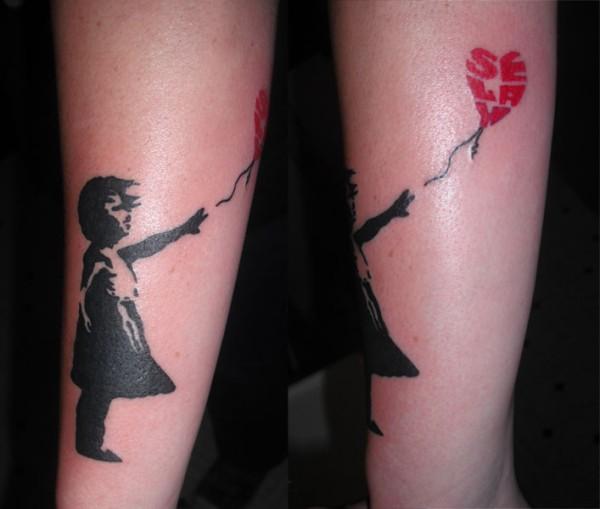 Black And Red Banksy Girl Tattoo Design For Leg