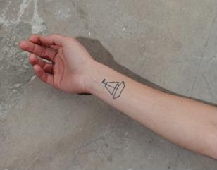 Black Boat Outline Tattoo On Wrist