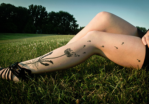 Black Dandelion Tattoo On Girl Full Leg