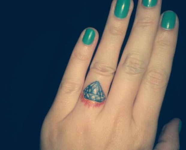Black Diamond Ring Tattoo On Girl Finger