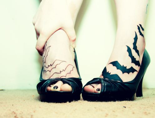 Black Flying Bats Tattoo On Girl Feet By Dee Piotrowski