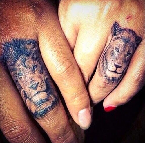 Black Lion And Lioness Head Tattoo On Couple Finger