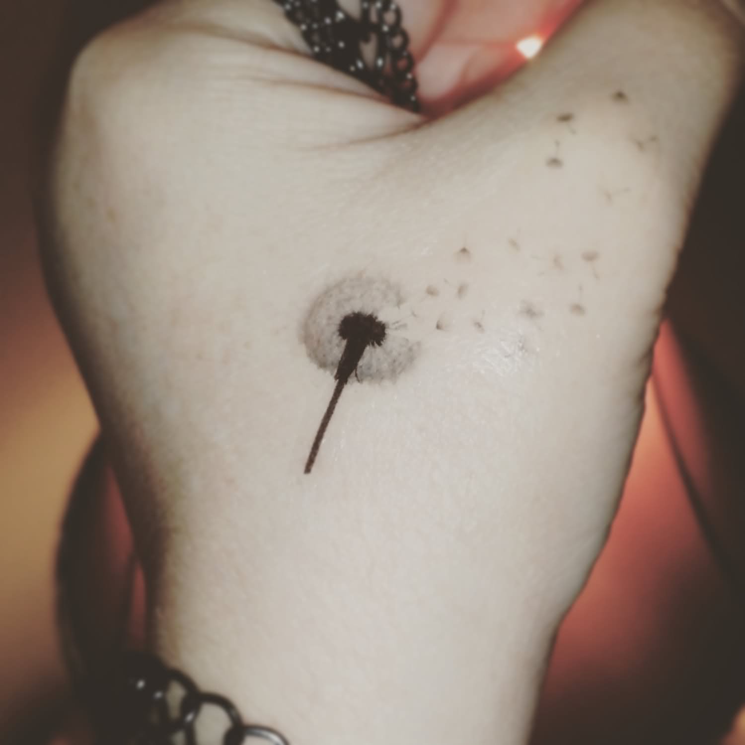 Black Little Dandelion Tattoo On Hand