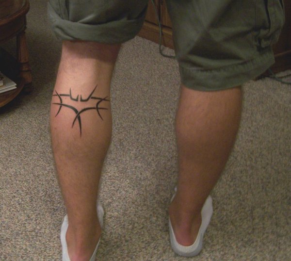 Black Tribal Batman Logo Tattoo On Leg Calf By Nathan Fears