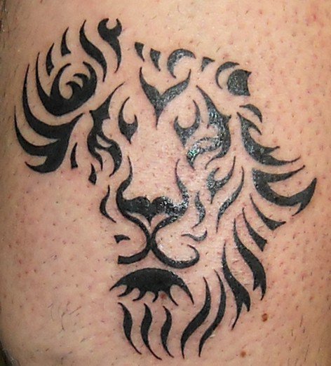Black Tribal Lion Head In African Map Shape Tattoo Design