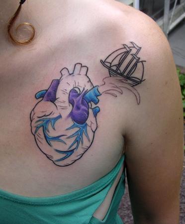 Blue And Purple Heart With Ship Tattoo On Girl Chest