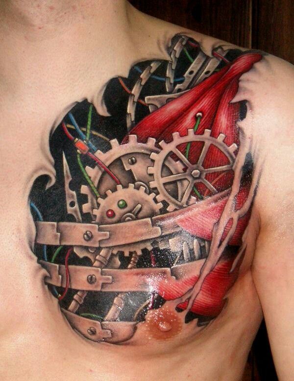 Colorful Ripped Skin Biomechanical Tattoo On Man Front Shoulder