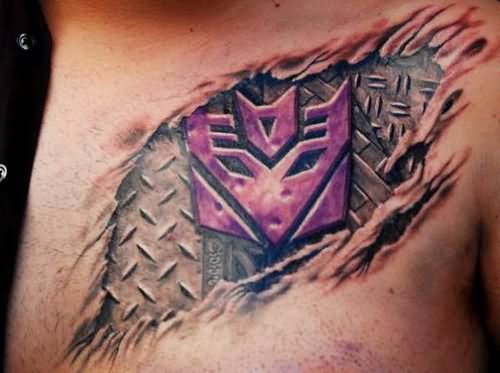 Colorful Ripped Skin Transformer Logo Tattoo On Man Front Shoulder