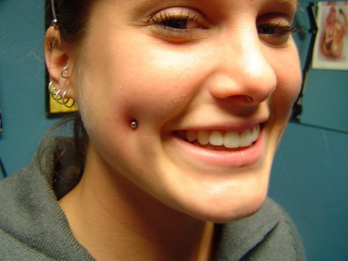 Cute Smiling Girl Have Dimple Piercing