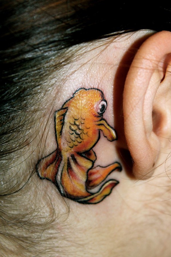 Cute Yellow Fish Tattoo On Behind The Ear