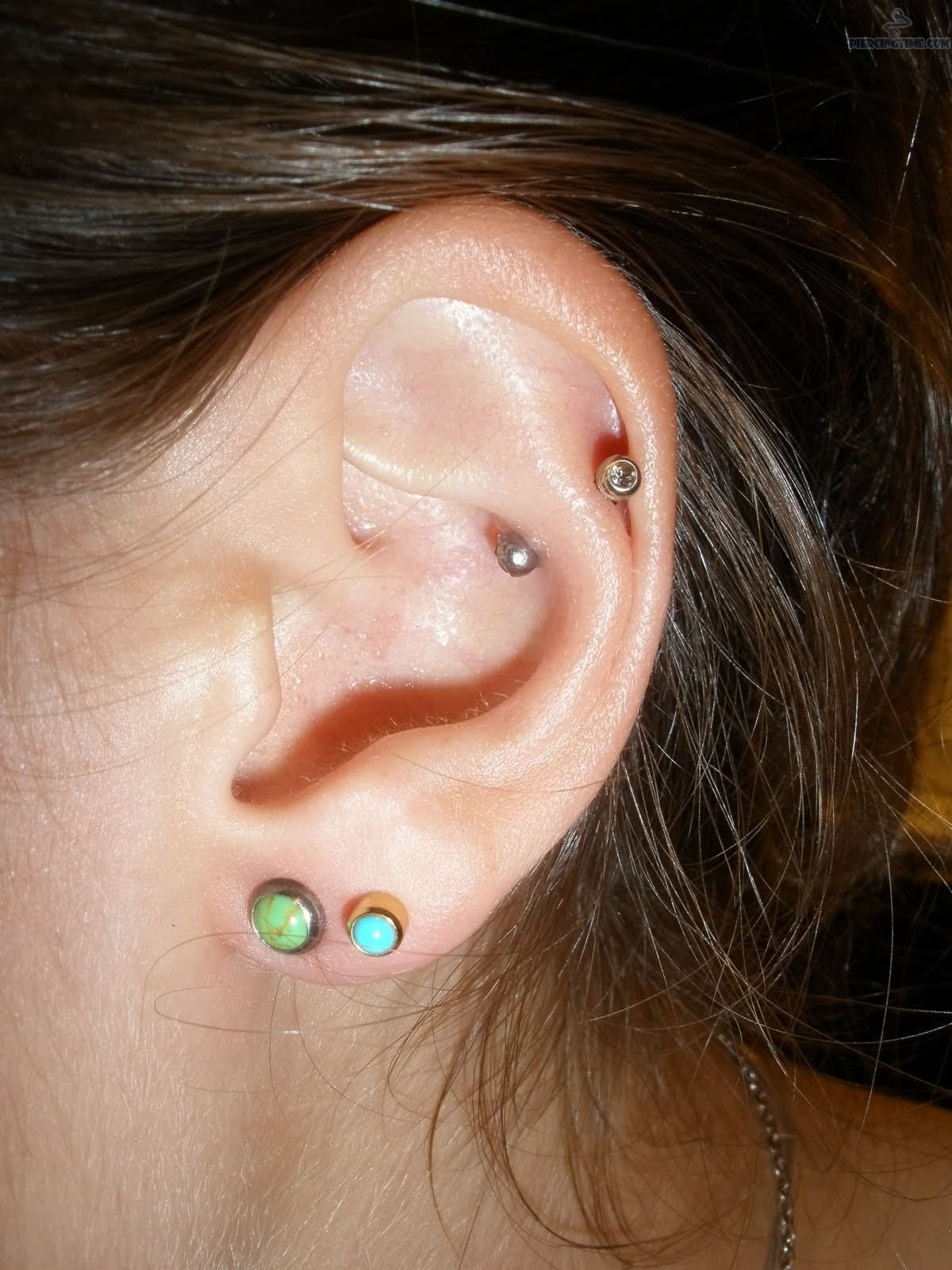 Double Lobe And Snug Piercing With Silver Barbell