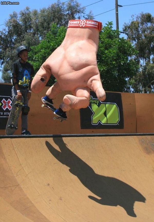 Giant Hand Funny Skateboarding Picture