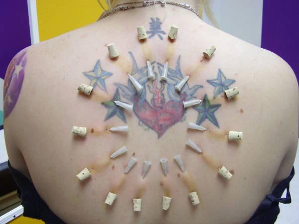 Girl Have Beautiful Back Piercing