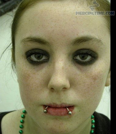 Girl With Devil Bites Piercing