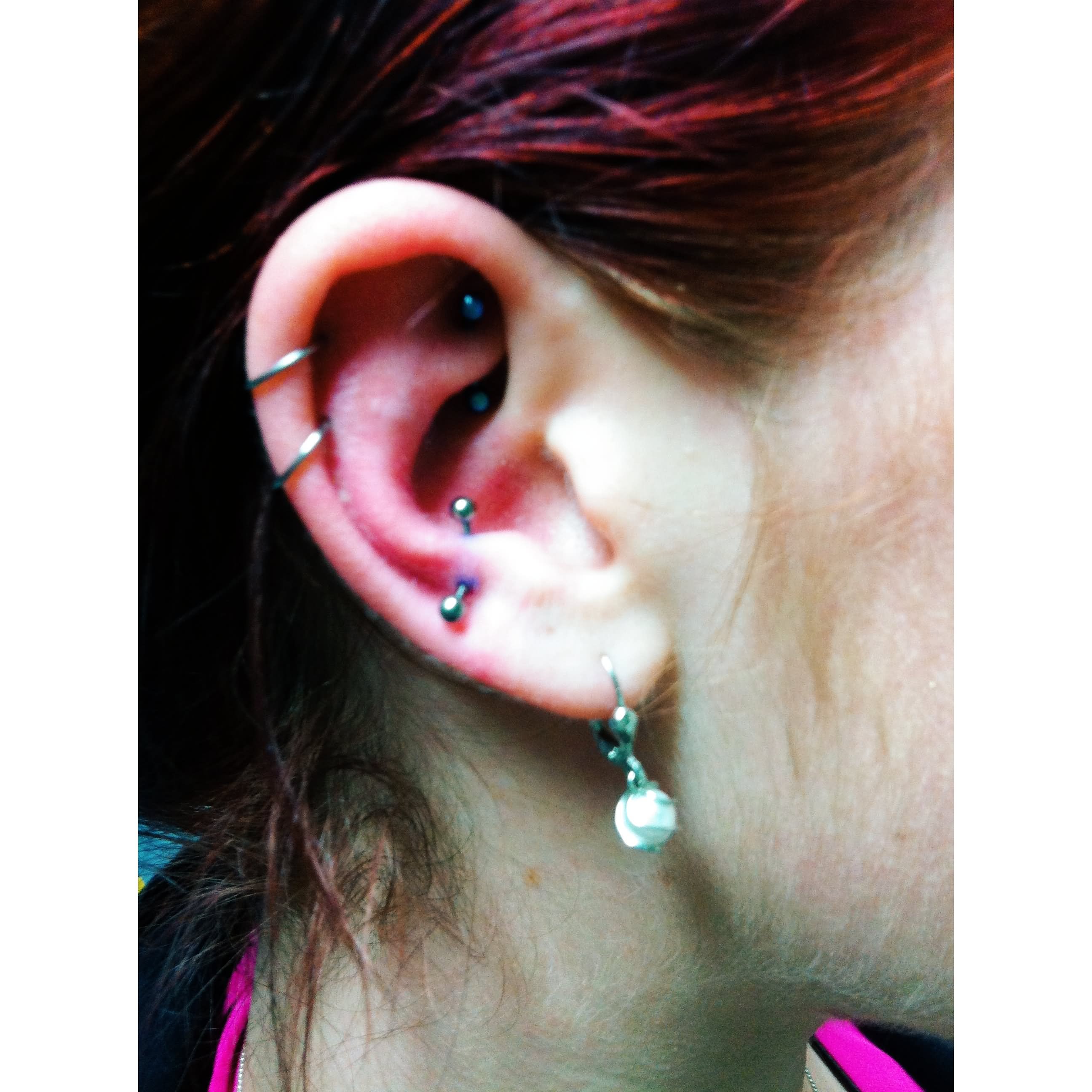 Girl With Spiral Helix And Snug Piercing With Curved Barbell