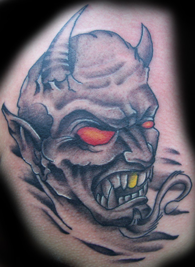 Grey Ink Demon Face Tattoo Design