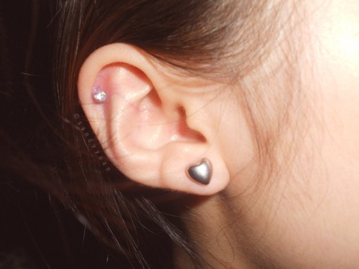 Heart Stud Lobe And Cartilage Piercing On Right Ear