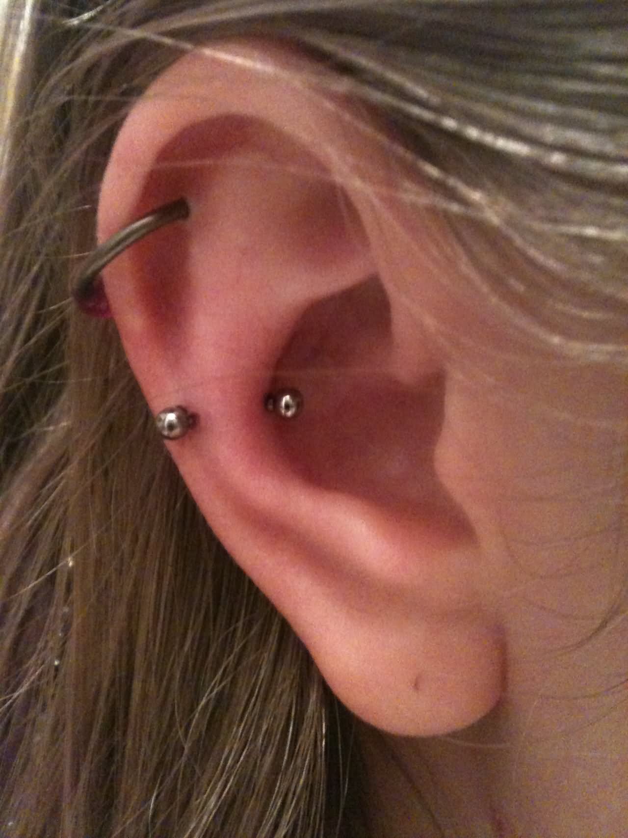 Helix And Snug Piercing Image