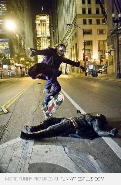 Joker Skateboarding Over Batman On Break Funny Picture