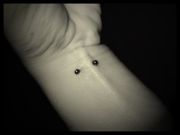 Left Wrist Piercing With Small Barbell