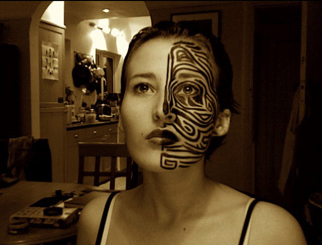 Maori Design Tattoo On Girl Half Face By Naomi