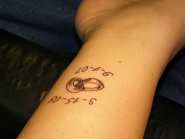 Memorial Wedding Ring Tattoo On Leg