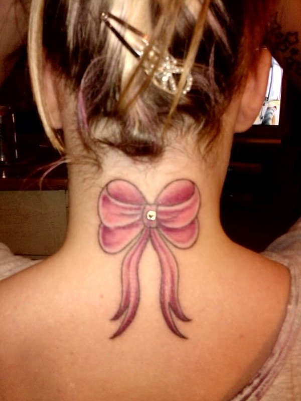 Pink Bow Tattoo On Girl Back Neck