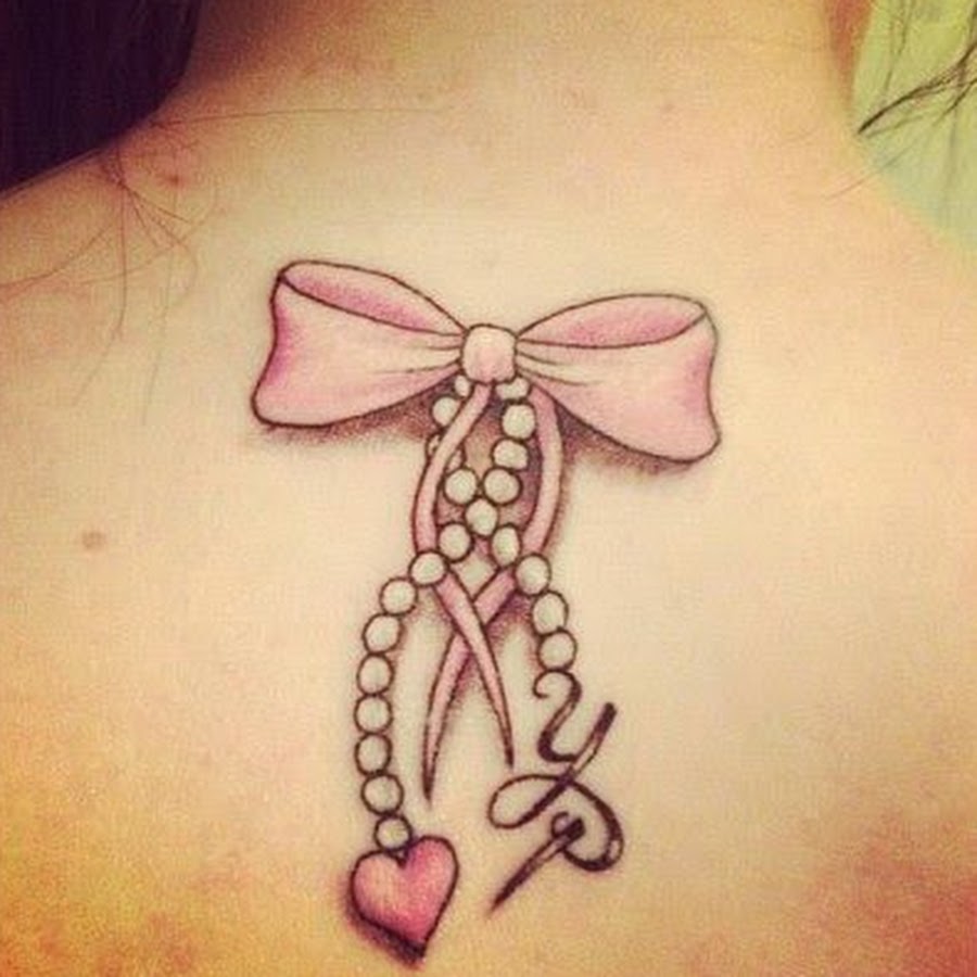 Pink Bow Tattoo On Upper Back