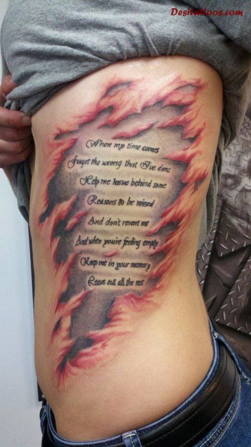Quote In Ripped Skin Tattoo On Side Rib