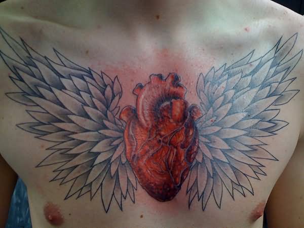 Red Real Heart With Wings Tattoo On Man Chest