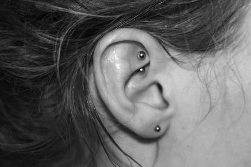 Right Ear Silver Stud Lobe And Rook Piercing