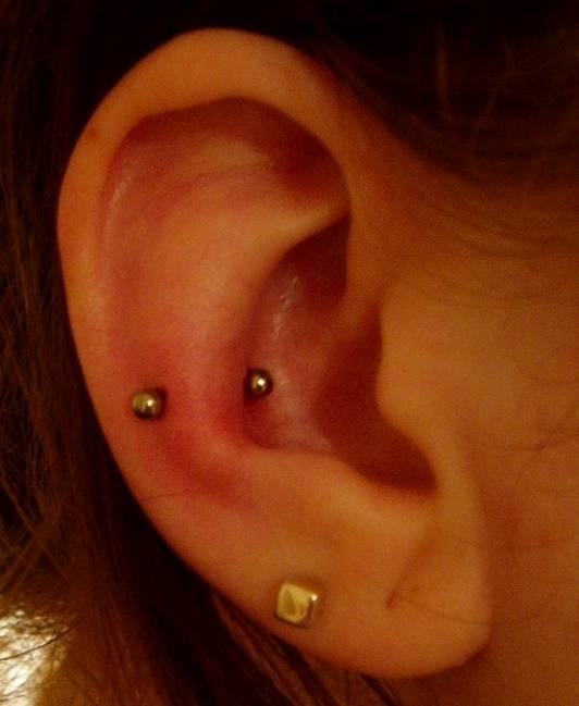 Right Ear Snug Piercing With Gold Barbell