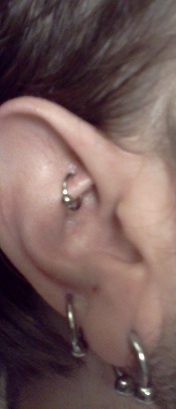 Rook Piercing With Small Bead Ring