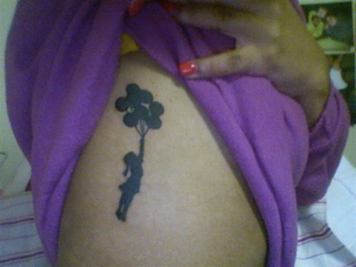 Silhouette Banksy Girl With Balloons Tattoo On Girl Side Rib