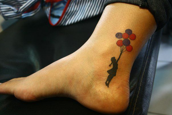 Silhouette Banksy Girl With Colorful Balloons Tattoo On Ankle