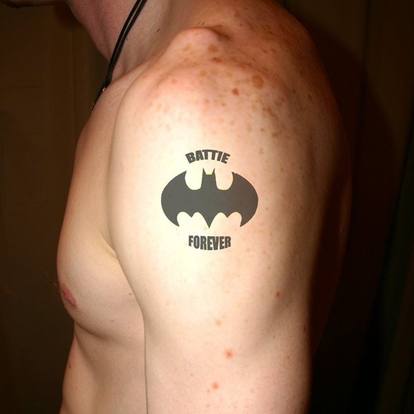 Silhouette Batman Logo Tattoo On Man Shoulder