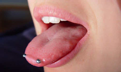 Surface Barbell Tongue Venom Piercing
