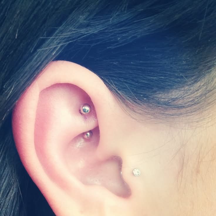 Tragus And Rook Piercing With Silver Barbell