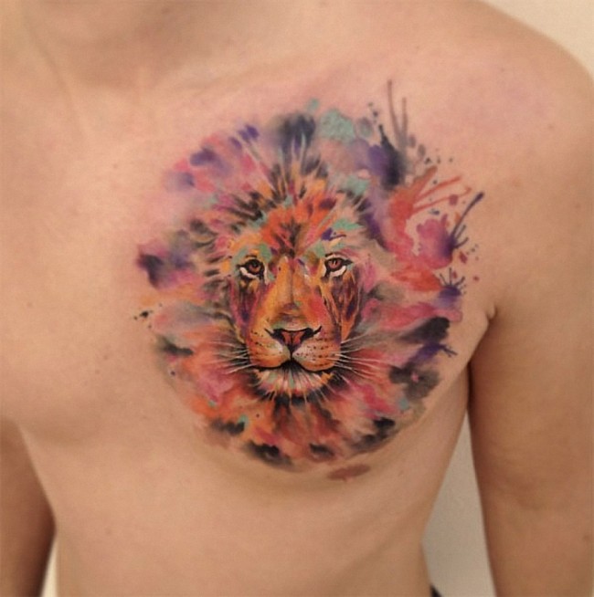 Watercolor Lioness Head Tattoo On Man Chest