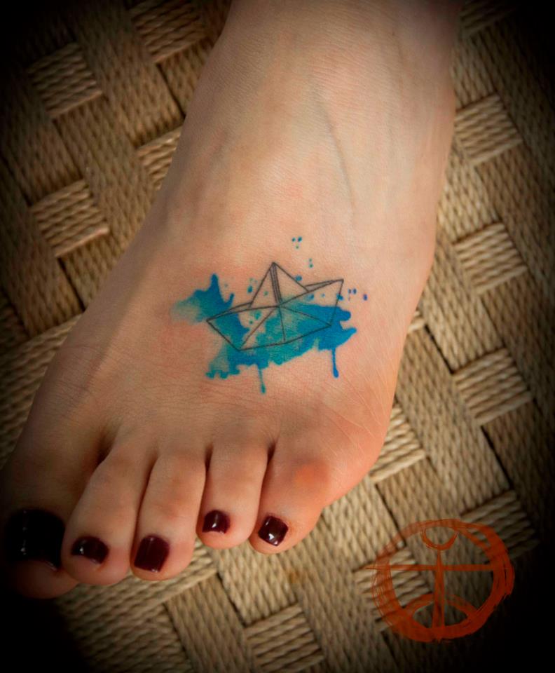 Watercolor Paper Boat Tattoo On Girl Foot