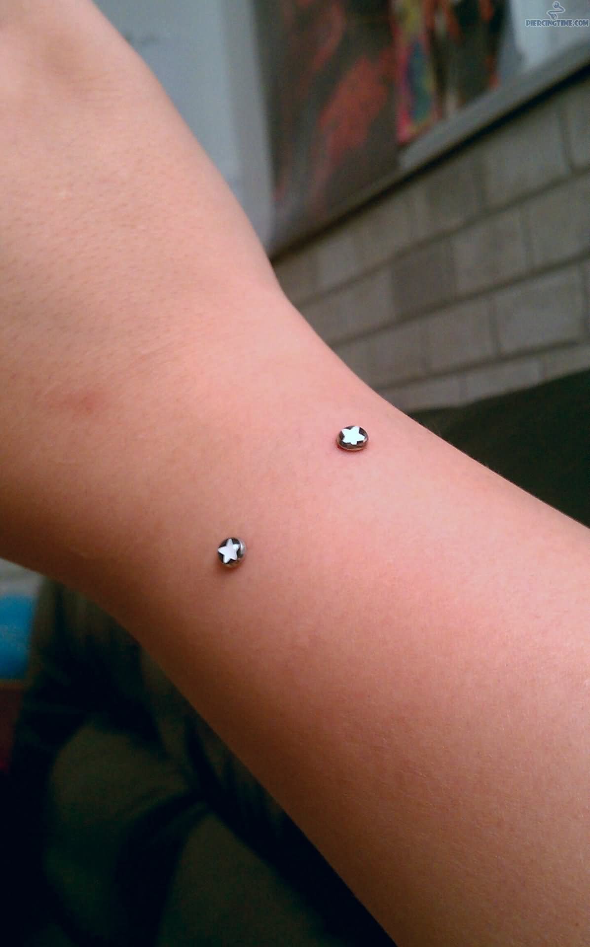 Wrist Piercing With Star Studs