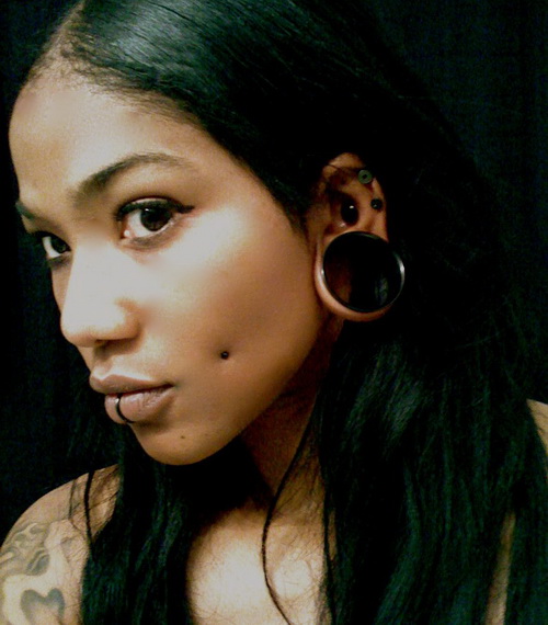 stretched Lobe And Dimple Piercing With Black Stud