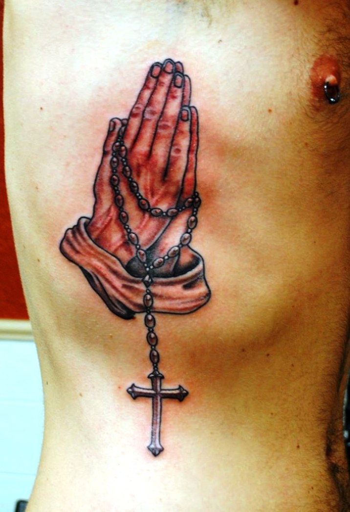 Amazing 3D Rosary Cross In Praying Hand Tattoo On Man Side Rib