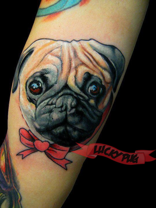 Amazing Colorful Pug Dog Face With Bow Tattoo On Bicep