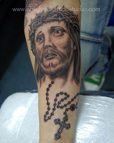 Amazing Jesus Face With Rosary Cross Tattoo On Forearm By Ray