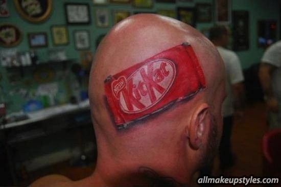 Awesome 3D Funny Kitkat Tattoo On Man Head